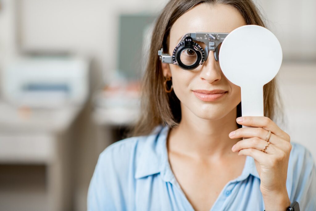 Young woman checking vision